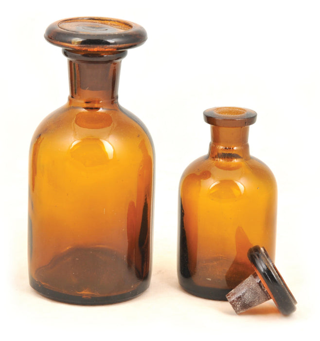 Bottle Reagent, made of soda glass, narrow neck, amber color with stopper, 60ml.