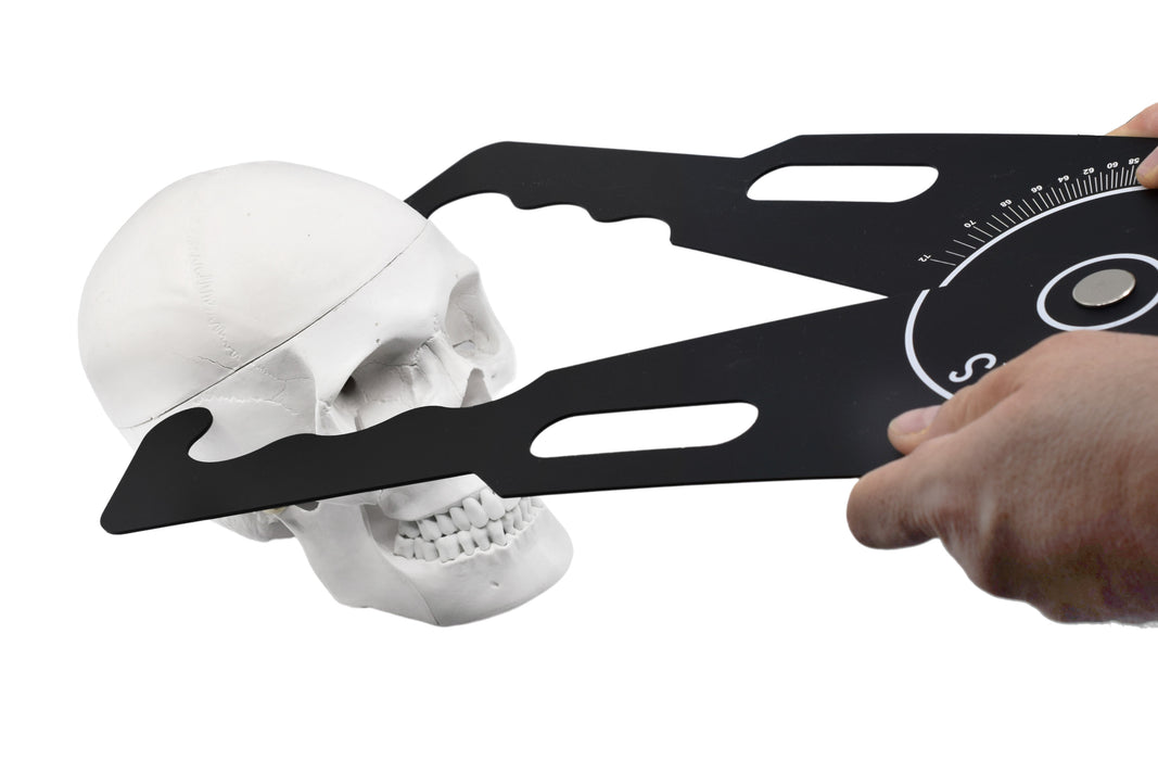 giant calipers measuring skull