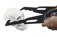giant calipers measuring skull