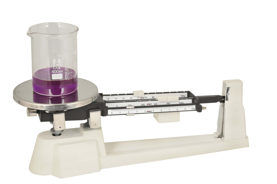 triple beam balance with beaker